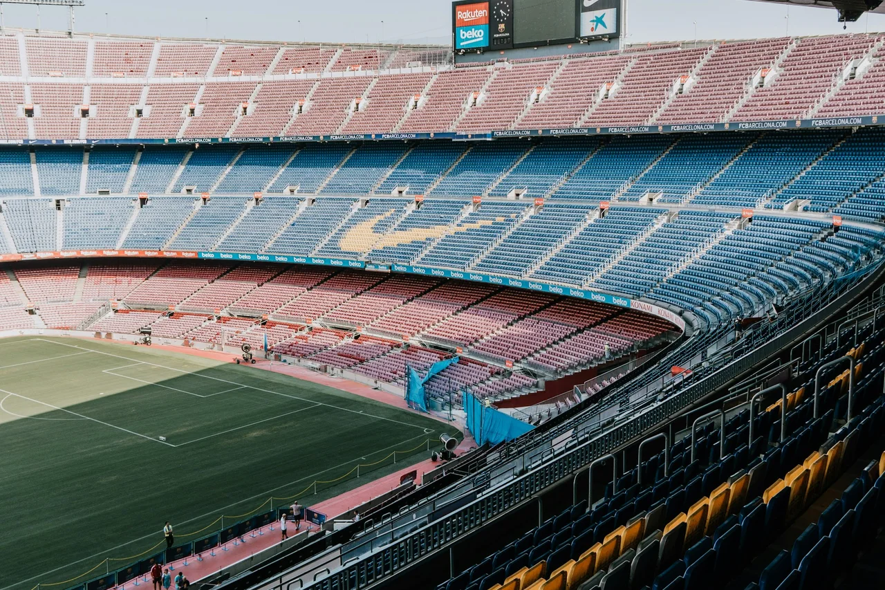 The pitch and blue-and-maroon stands at Camp Nou before redevelopment